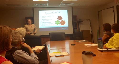  Dr. Amy Elliott speaking to other researchers