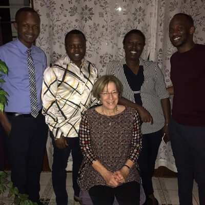 Image of 2nd Year Fellow Dr. J. Damas Kabakambira, 1st Year Fellow Dr. Jean N. Utumatwishima, Program Director Dr. Anne Sumner, 3rd Year Fellow Dr. Regine Mugeni, 4th Year Fellow Dr. Arsene F. Hobabagabo.