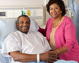 African American adult couple in hospital