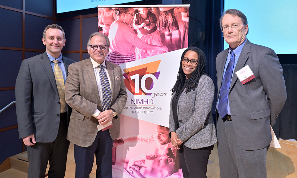 (L - R) Dr. Colter Mitchell, University of Michigan, Ann Arbor; Dr. Spero Manson, University of Colorado Denver's Anschutz Medical Center; Dr. Marcella Nuñez-Smith, Yale University; and Dr. Michael H. Sayre, director of the Division of Integrative Biological and Behavioral Sciences at NIMHD.
