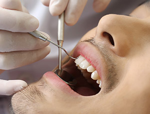 Dental examination on adult male