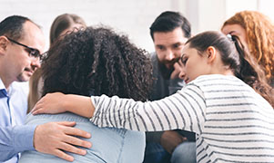 People hugging.