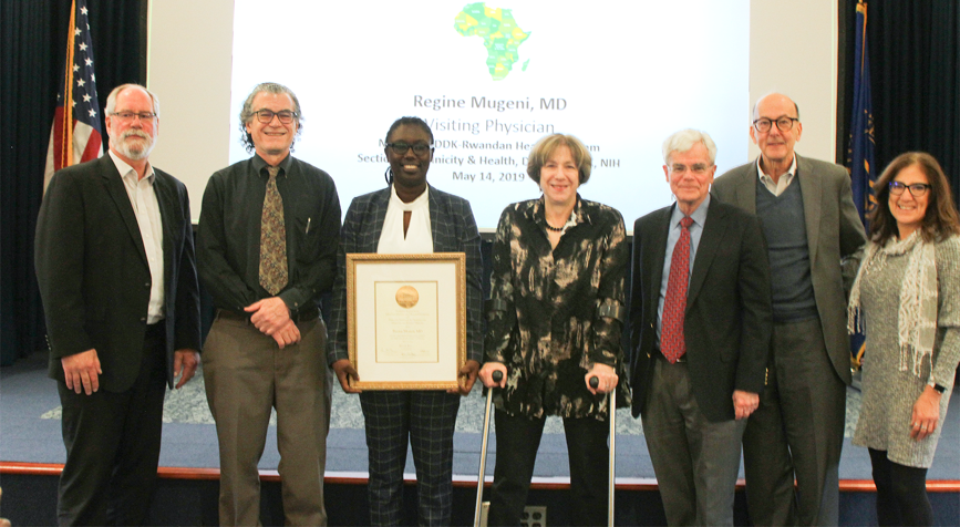 (l-r) Dr. Michael Krause, Dr. Eliseo J. Pérez-Stable, Dr. Regine Mugeni, Dr. Anne E. Sumner, Dr. Michael Gottesman, Dr. Roger Glass, Dr. Anna María Nápoles.